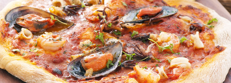 Pizza aux fruits de mer - idée recette facile Mysaveur