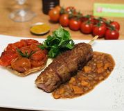 Magret de canard au Ras El Hanout et tatin de tomates au balsamique